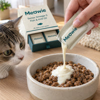 Fingers snapping open a Meowie snap-pack over cat food