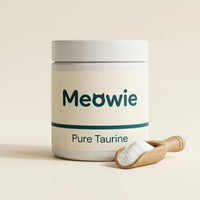 Meowie Pure Taurine tub with a scoop of taurine powder